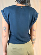 Maglia asimmetrica accessorio