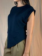 Maglia asimmetrica accessorio
